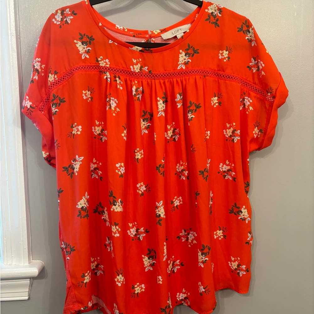 Loft short sleeved coral colored floral mixed media top